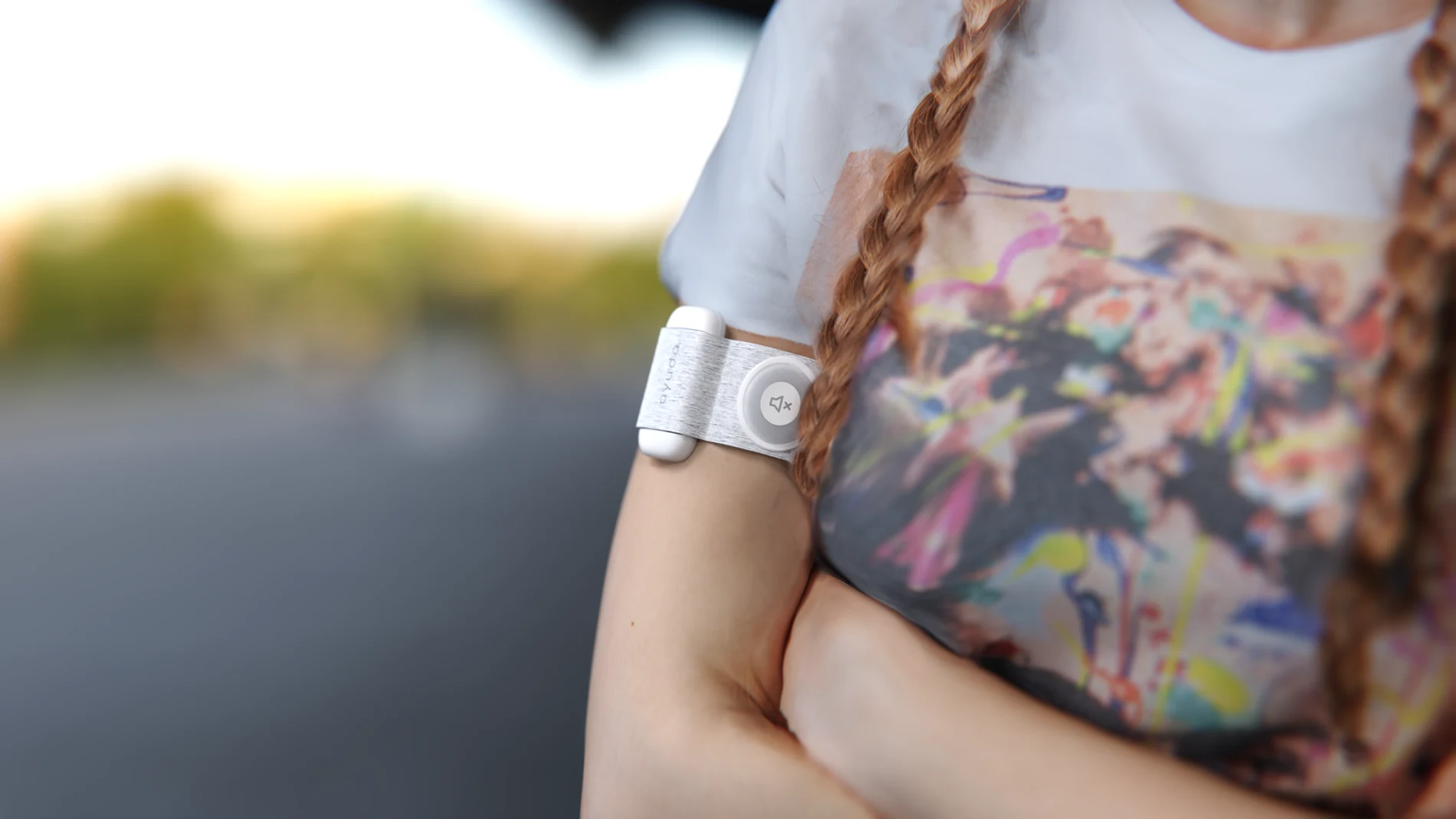 Tattooed person wearing ARMband, official Ayuda imagery